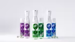 The image shows three Cif cleaning products in plastic spray bottles with refill packs shown alongside. There are three different product variants with purple, green and blue labels.